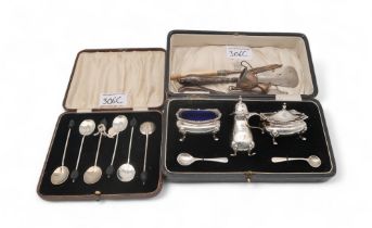 A collection of silver including a cased three piece cruet set, by Elkington & Co, Birmingham, the