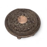 An Egyptian white metal niello filigree powder compact, with decoration of boats to the lid and palm