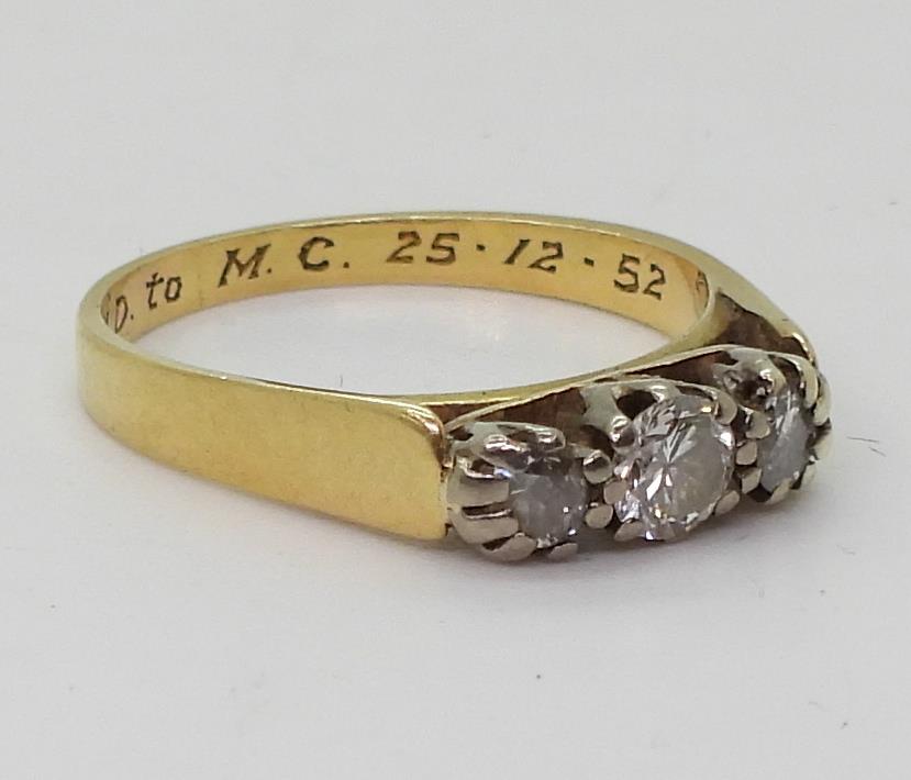An 18ct gold three stone diamond ring set with estimated approx 0.50cts of brilliant cut diamonds, - Image 3 of 5