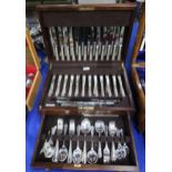 A two drawer canteen of stainless steel cutlery, by Harrods of London, 124 pieces Condition Report: