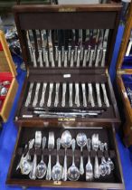 A two drawer canteen of stainless steel cutlery, by Harrods of London, 124 pieces Condition Report: