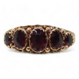 A 9ct gold five garnet set ring, with Chester hallmarks for 1911, size Q, weight 1.9gms Condition