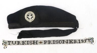 A WW1 Prisoner of War beadwork band, reading "Turkish Prisoner 1917", together with a circa-1920s