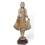 A large gilt wood paste stone inlaid Mandalay style Buddha, on hardwood stand, 93cm Condition