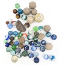A small collection of marbles Condition Report:Available upon request