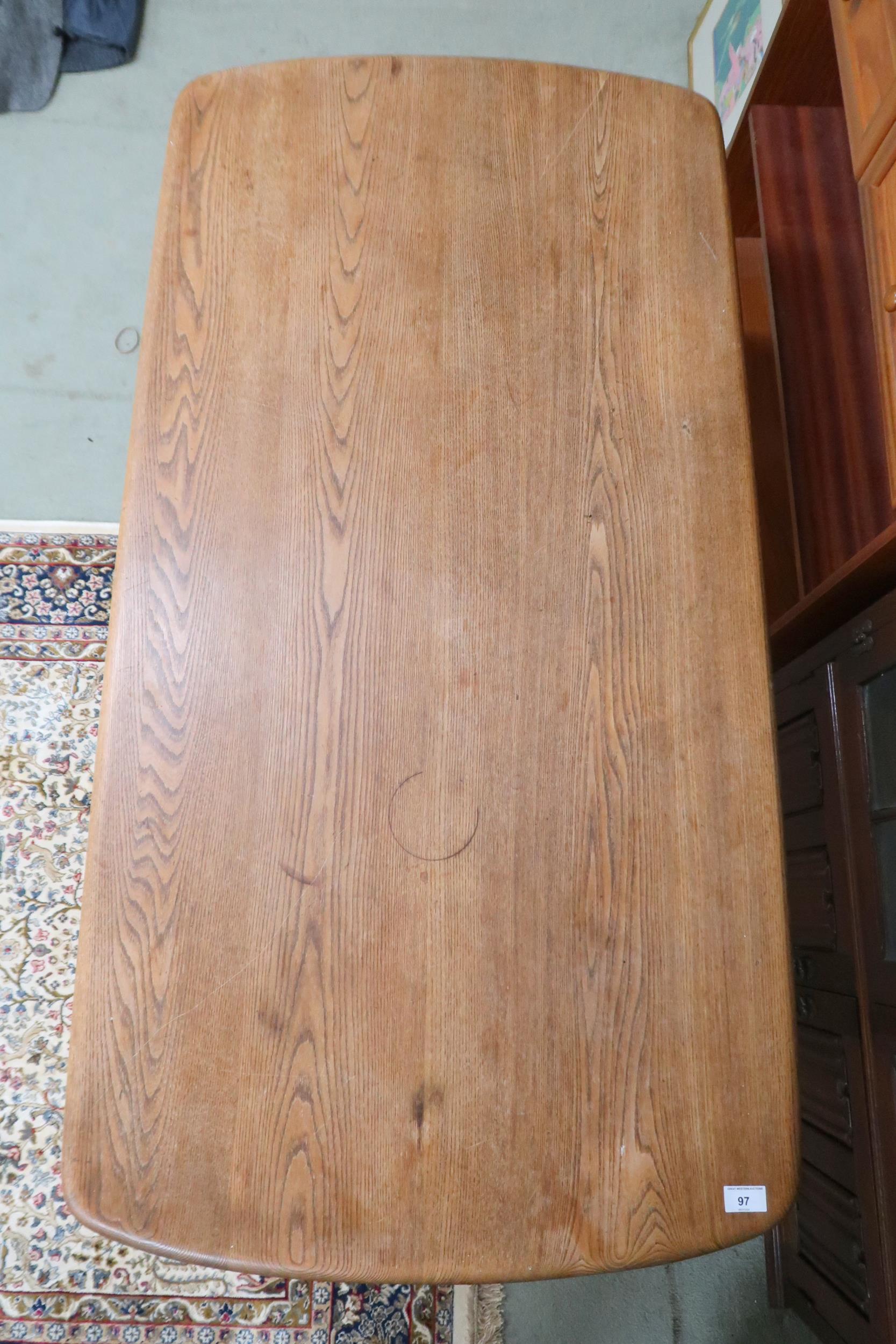 A lot comprising mid 20th century Elm and beech Ercol dining table on tapering splayed supports, - Image 3 of 4