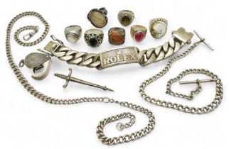 A collection of silver and white metal to include a heavy curb chain bracelet with a 'Rolex' Design,