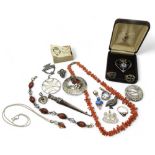 A collection of Scotish silver items to include items by Ola Gorie, Iona silver, a Heart of