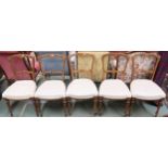 A set of five Victorian walnut framed dining chairs on turned front supports, 87cm high (5)