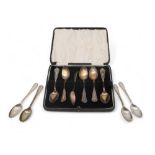 A cased set of Sterling teaspoons, and four silver teaspoons, London marks, 109gms (5) Condition