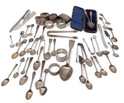 A large collection of silver flatware including a Georgian Scottish silver tablespoon, probably by