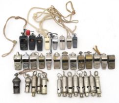 Assorted whistles, to include a military-issue Acme Thunderer, another issued by the City of Glasgow
