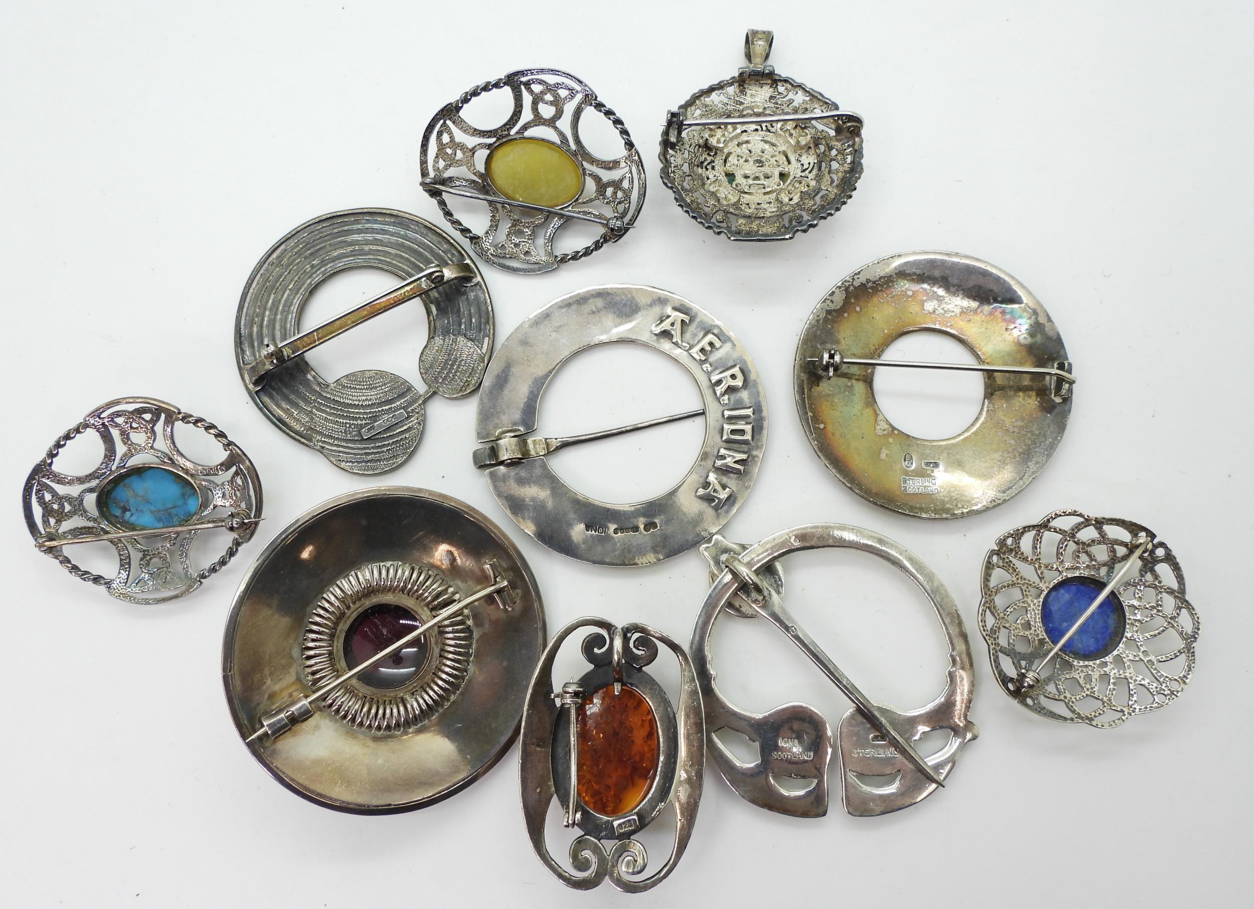 A collection of Celtic style brooches, to include a A & E Ritchie pattern brooch stamped with the - Image 2 of 3