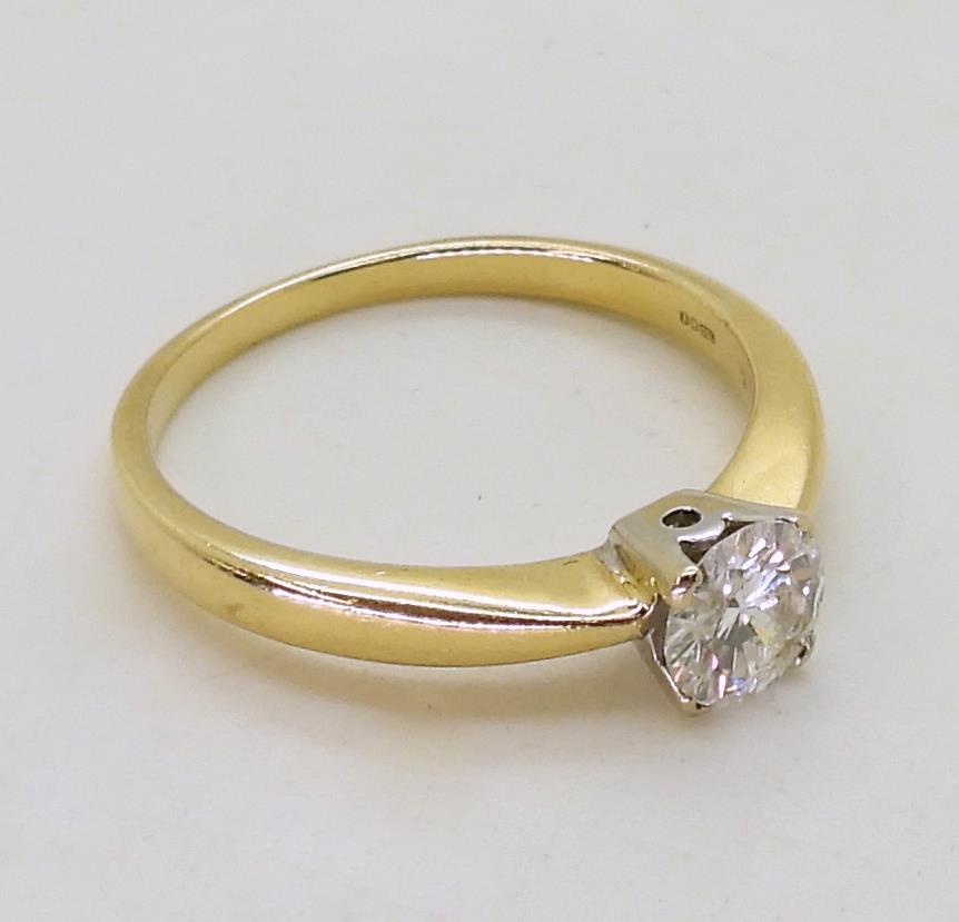 An 18ct gold diamond solitaire ring of estimated approx 0.60cts, size Q1/2, weight 3.4gms - Image 3 of 4