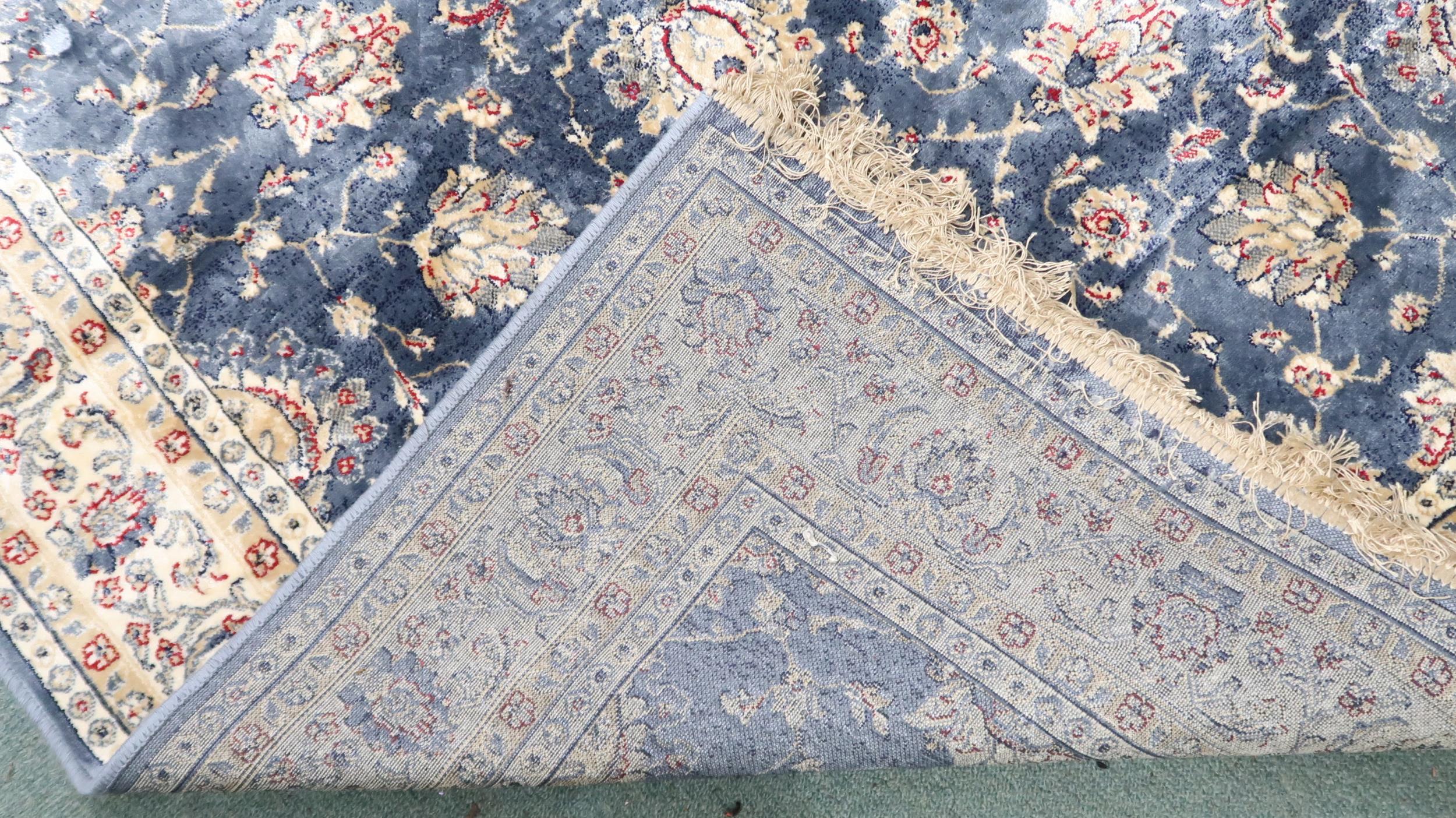 A duck egg blue ground full pile Kashmir Zeigler rug with floral patterned ground within flower head - Image 3 of 3