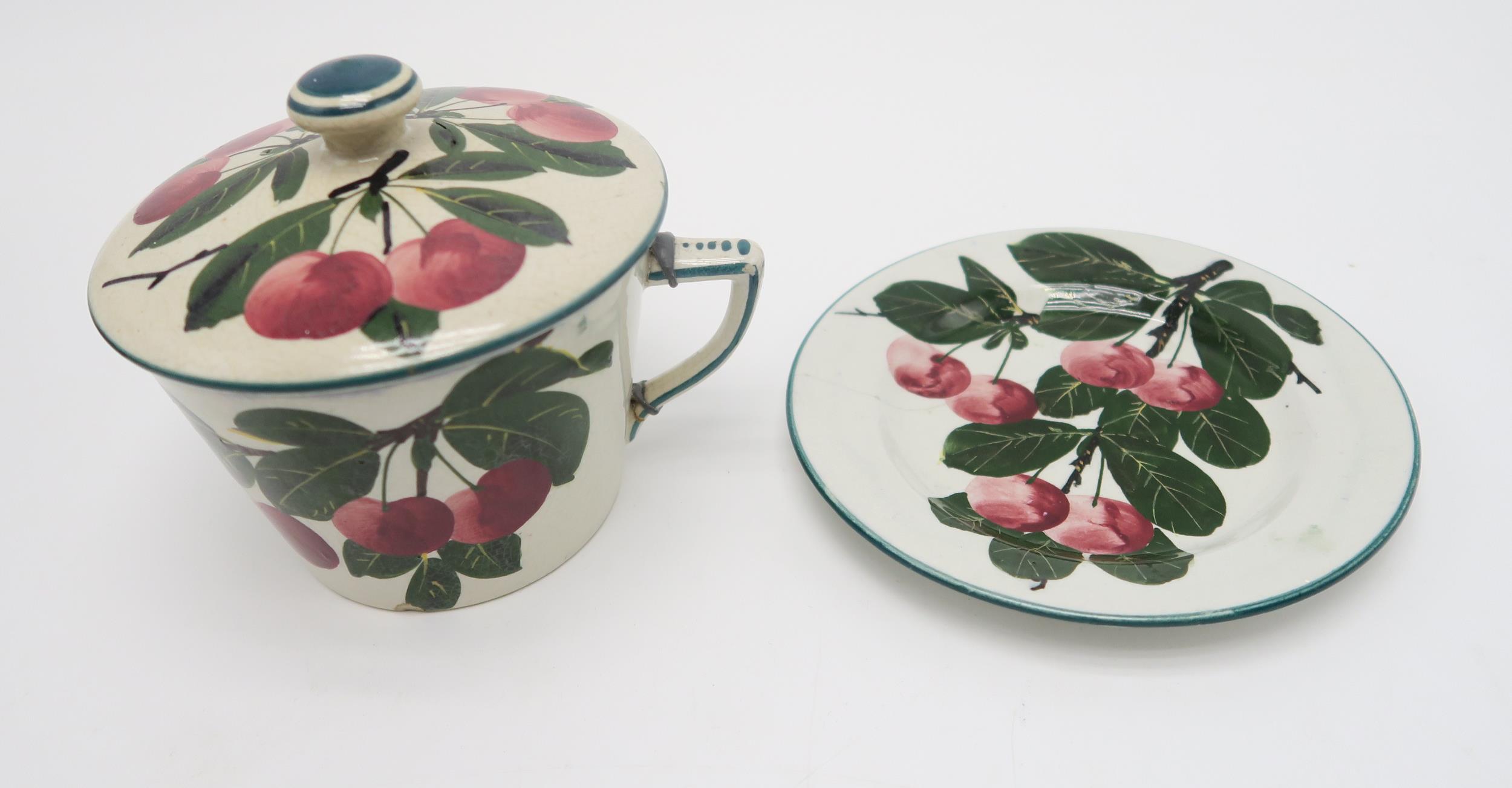 A collection of Wemyss ware cherry painted pottery including a two handled bowl, a chocolate cup and - Image 5 of 6