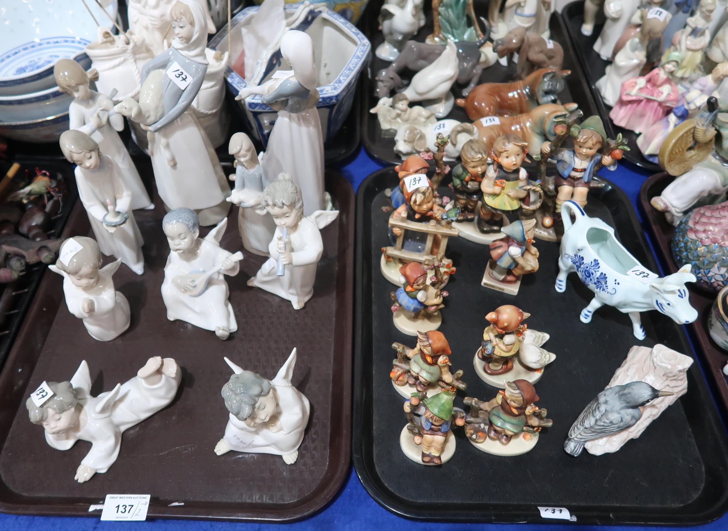 A collection of Lladro figures together with a collection of Hummel figures etc Condition Report: