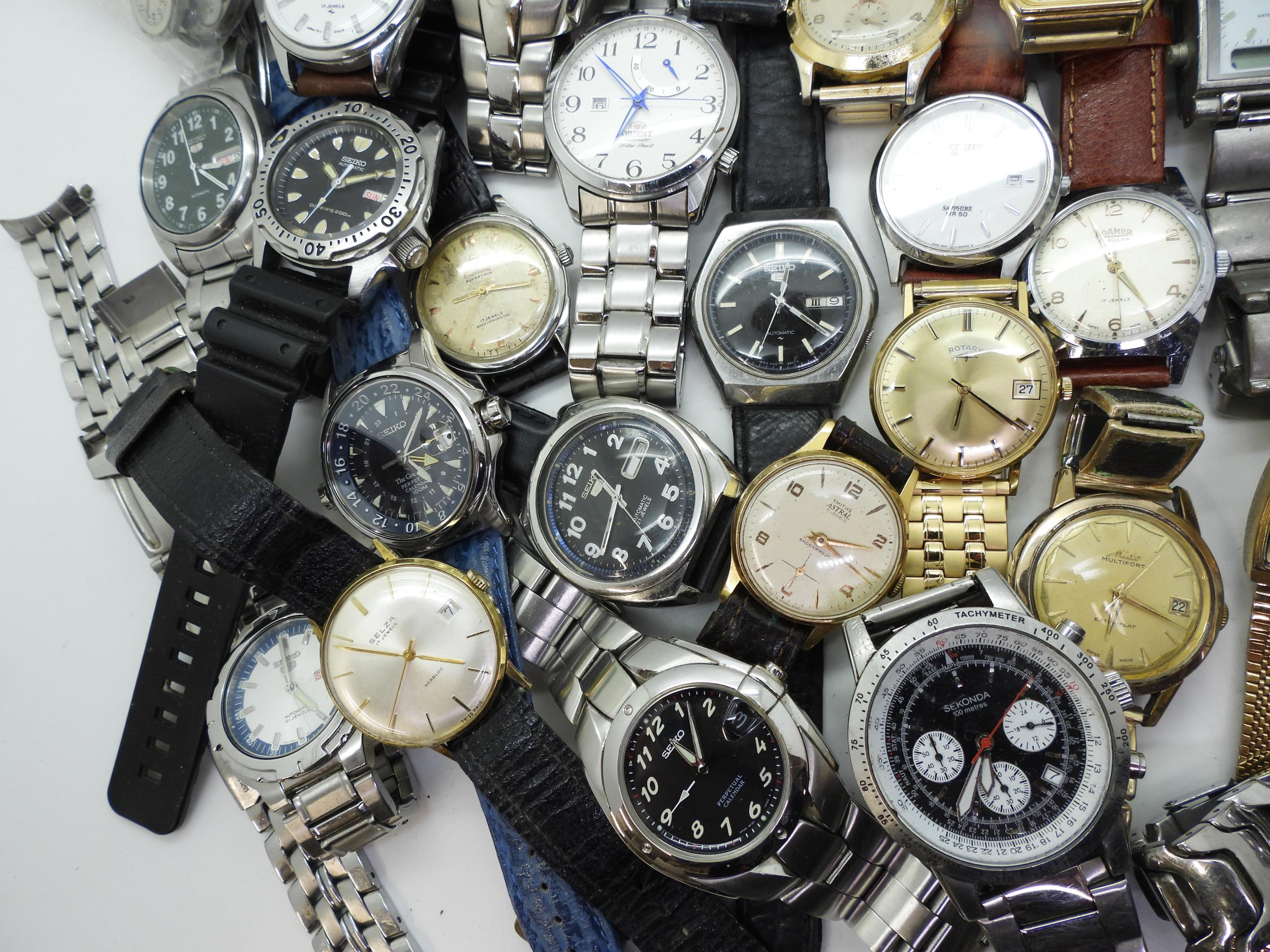 A collection of gents fashion watches to include Seiko, Roamer, Astral, Mido and replica watches. - Image 2 of 5