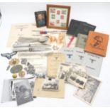 A collection of items relating to the German Third Reich, comprising a Waffen-SS Panzer dog tag;