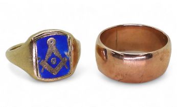 A 9ct gold Masonic swivel signet ring, size Q1/2, and a 9ct rose gold wide wedding ring, size Q,