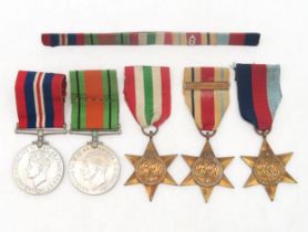 A WW2 medal group of five, comprising War Medal, Defence Medal, 1939-1945 Star, Italy Star and