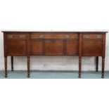 A late Victorian mahogany inverted breakfront sideboard with three drawers over three cabinet