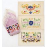 A WW1-period embroidered silk handkerchief, together with three embroidered silk postcards of