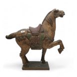 A Chinese carved wooden polychrome horse, in the Tang Style Condition Report:Available upon request