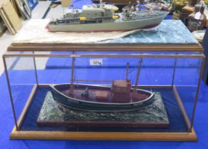 A model fishing boat named Anne, AH. 153, housed in a glass case measuring approx. 65cm x 35cm x