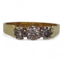 An 18ct gold three stone diamond ring set with estimated approx 0.50cts of brilliant cut diamonds,