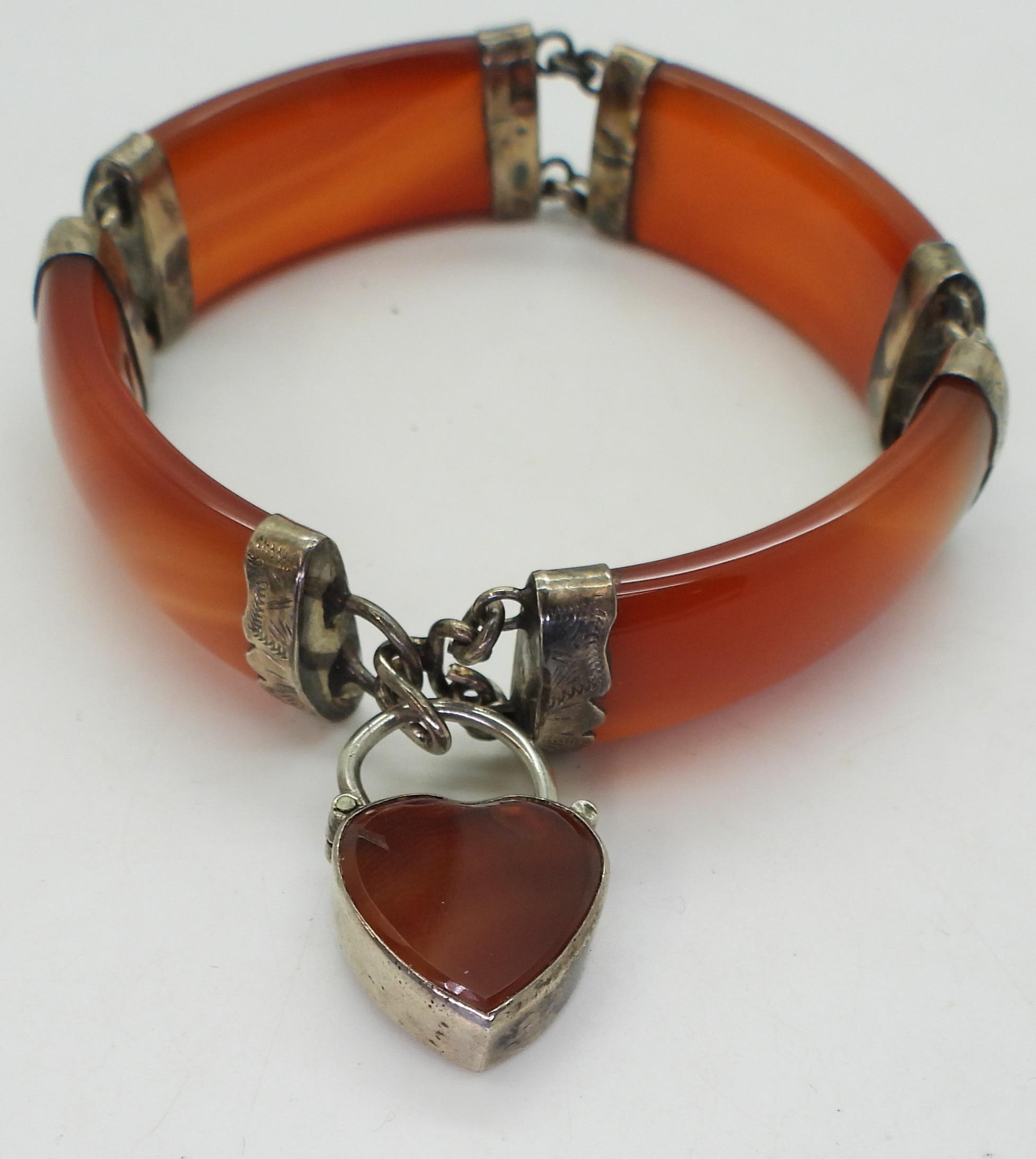 A Scottish carnelian bracelet with heart shaped carnelian set clasp, mounted throughout in - Image 3 of 5