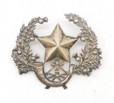 A silver Cameronians (Scottish Rifles) Officer's Glengarry cap badge, maker's mark rubbed,
