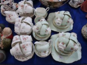 A Paragon teaset with green ground and flowers together with a Duchess June Bouquet tea service