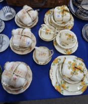 A New Chelsea Chrysanthemum pattern teaset, a Royal Albert Georgia pattern teaset, and a Foley