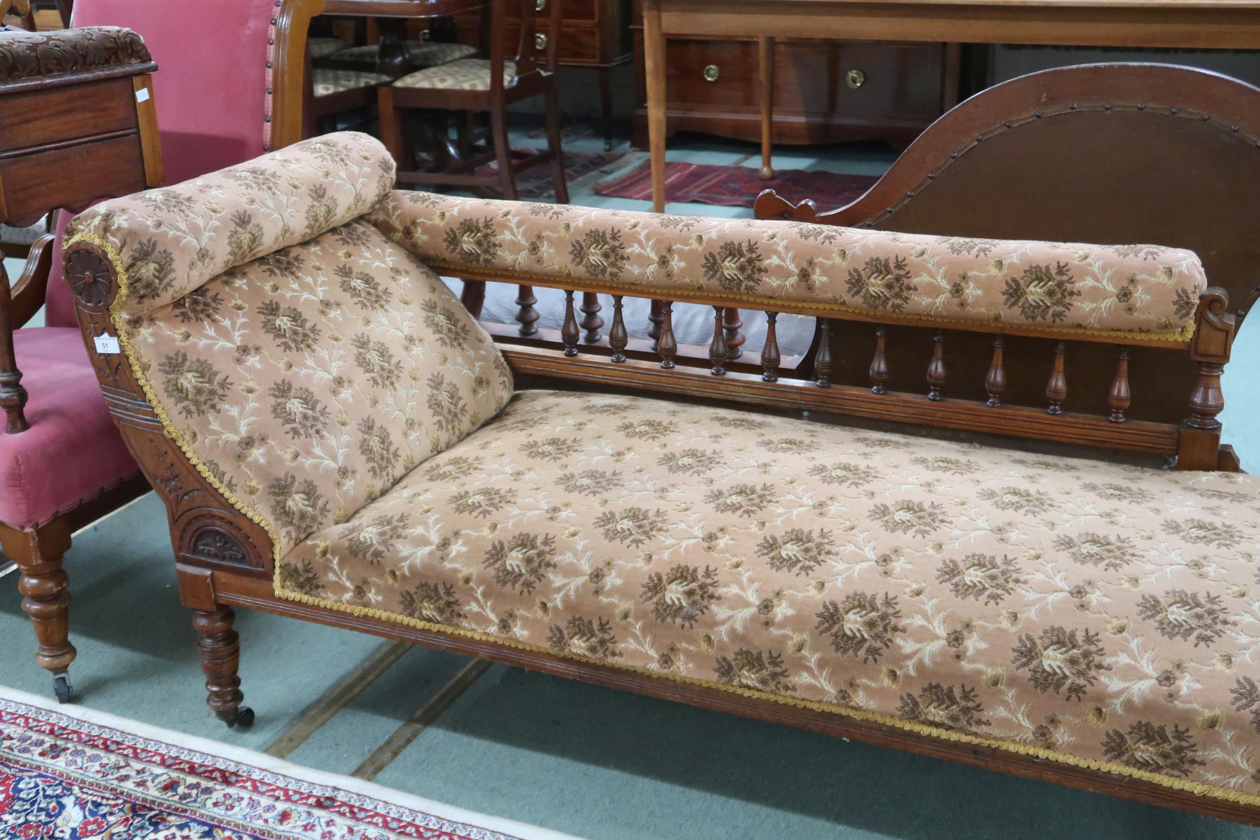 A Victorian oak framed chaise longue with spinel back and scroll end on turned supports - Image 2 of 2