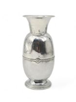 An Arts and Crafts silver vase, in the style of Albert Edward Jones, by GL Connell, Birmingham 1925,