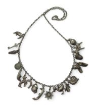 A traditional Dutch silver charm necklace, with eighteen silver and white metal attached charms