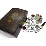 A mother of pearl and brass inlaid marquetry box, containing, a base metal Nirvana pocket watch with