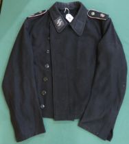A WW2 German Panzer tank wrap tunic, ink-stamped indistinctly to interior and bearing Waffen-SS