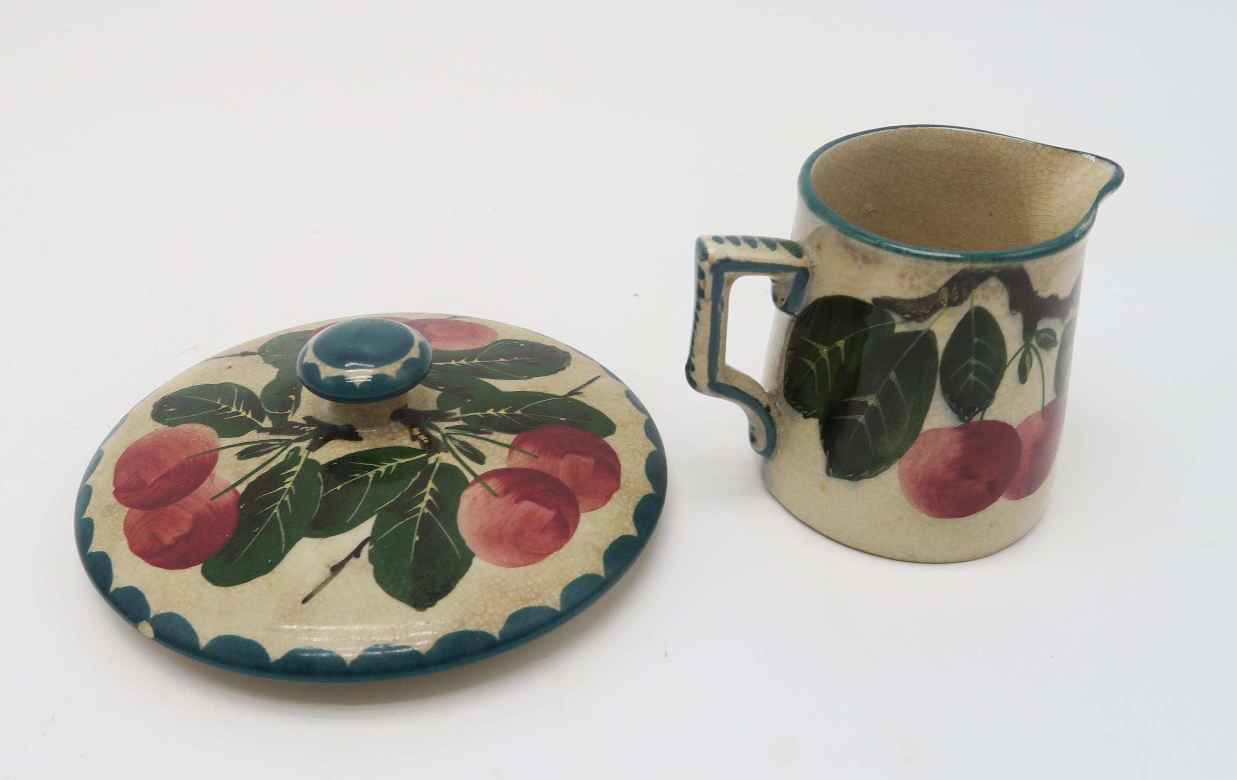A collection of Wemyss ware cherry painted pottery including a two handled bowl, a chocolate cup and - Image 6 of 6