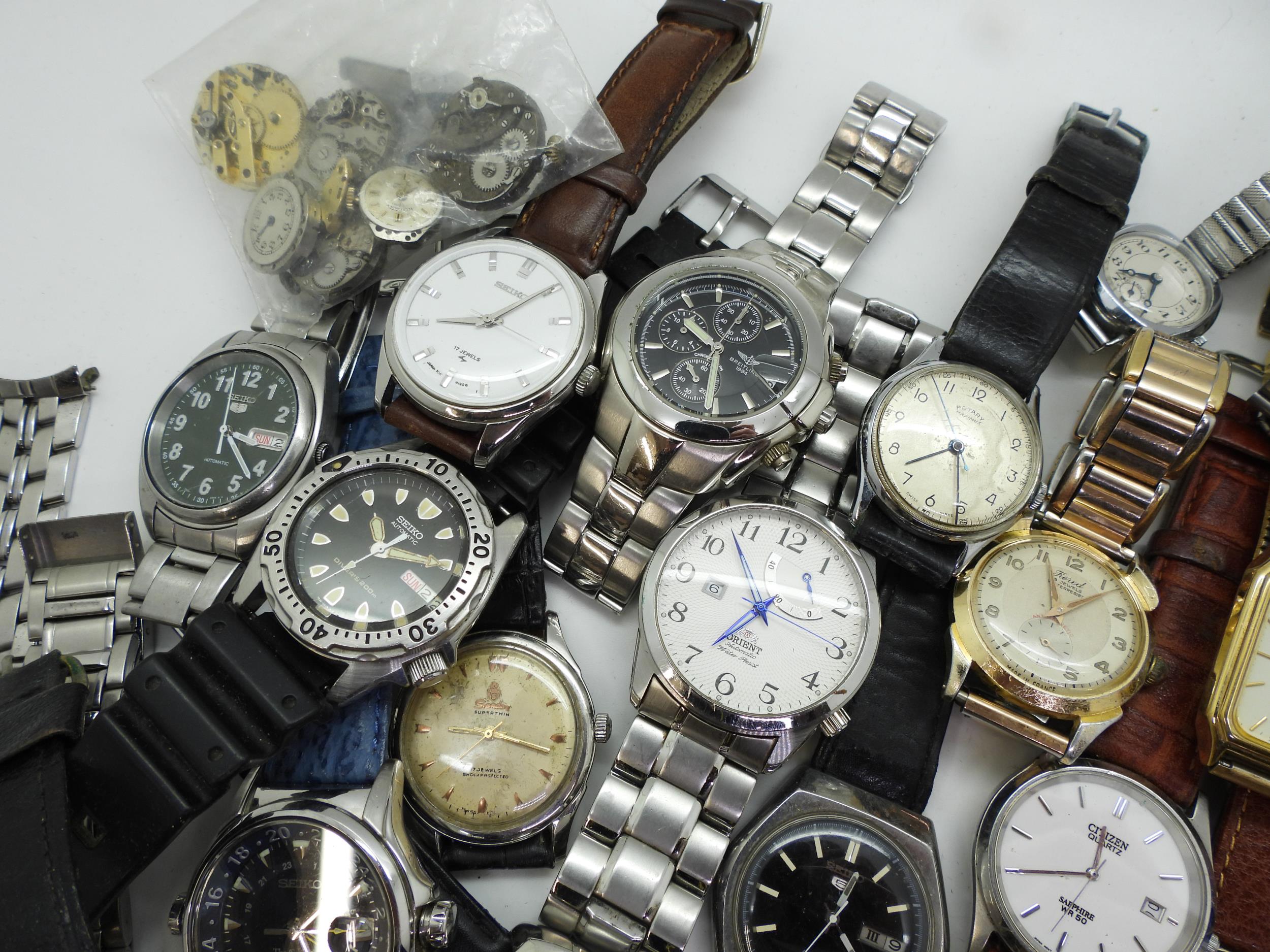 A collection of gents fashion watches to include Seiko, Roamer, Astral, Mido and replica watches. - Image 3 of 5