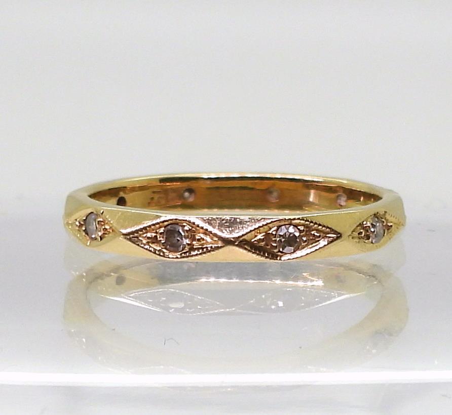 An 18ct gold full diamond eternity ring of facet pattern, size M1/2, weight 2.6gms Condition - Image 2 of 3