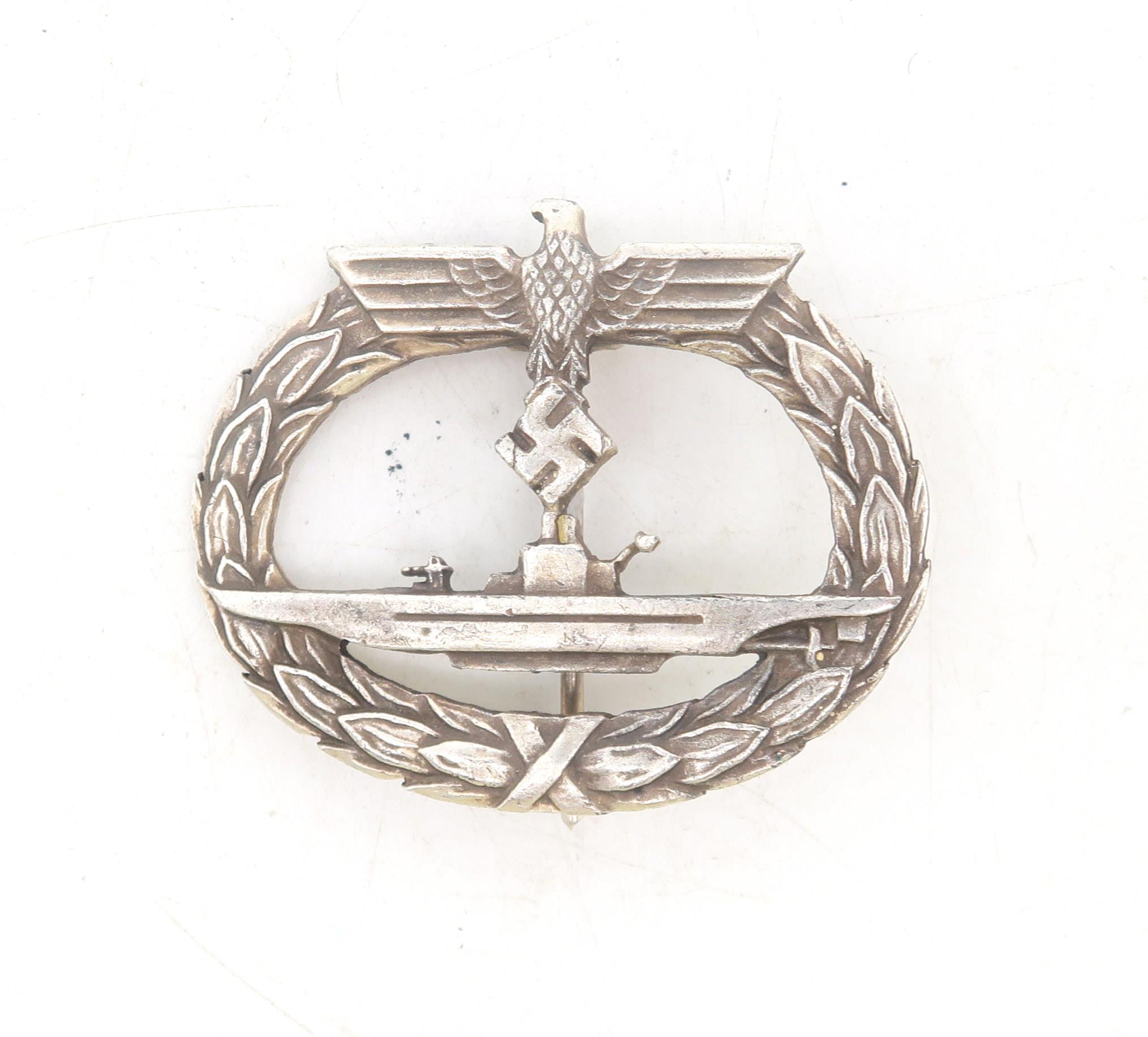 A WW2 German Third Reich Kriegsmarine U-boat/submarine War Badge, marked verso "Munchen 9"; an - Image 2 of 4