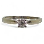 An 18ct white gold diamond solitaire ring, set with an estimated approx 0.20cts, finger size O1/2,