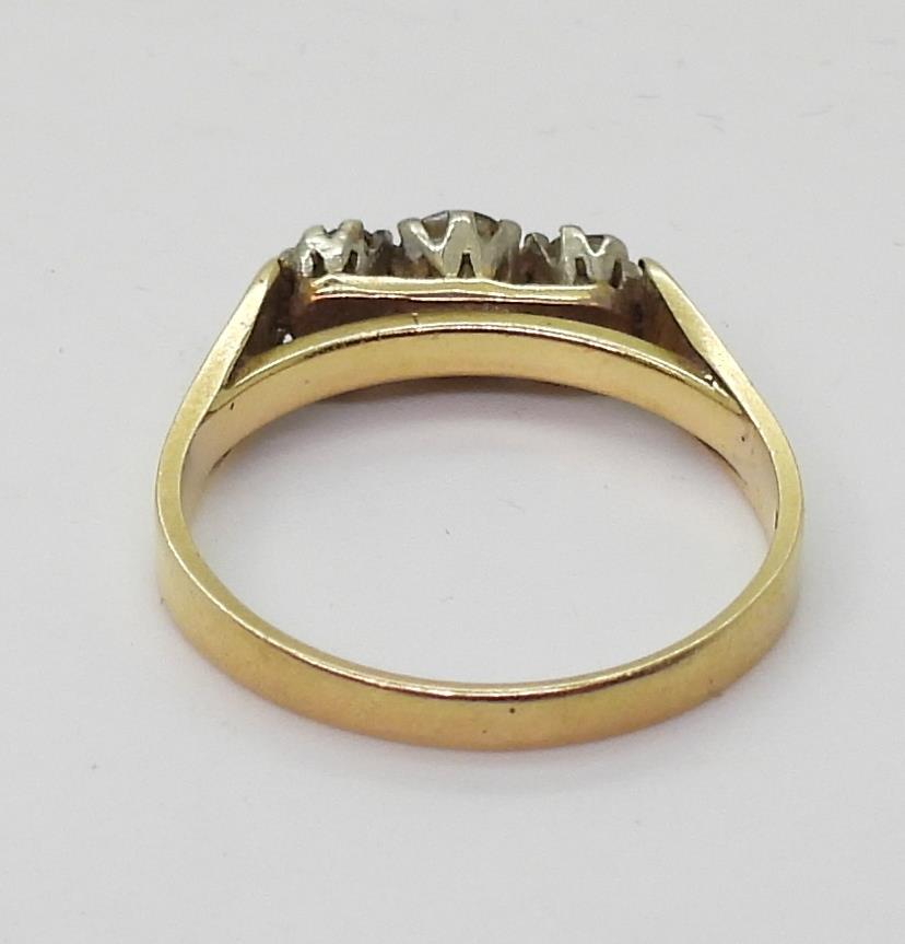 An 18ct gold three stone diamond ring set with estimated approx 0.50cts of brilliant cut diamonds, - Image 5 of 5