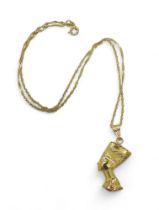 An Egyptian gold Nefertiti pendant and chain, with Arabic gold strike marks, the clasp further