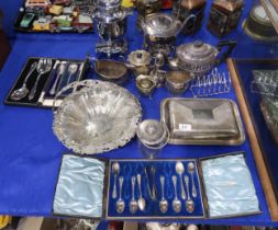 A collection of EPNS including a tea urn, a spirit kettle on stand, entree fishes, swing-handled