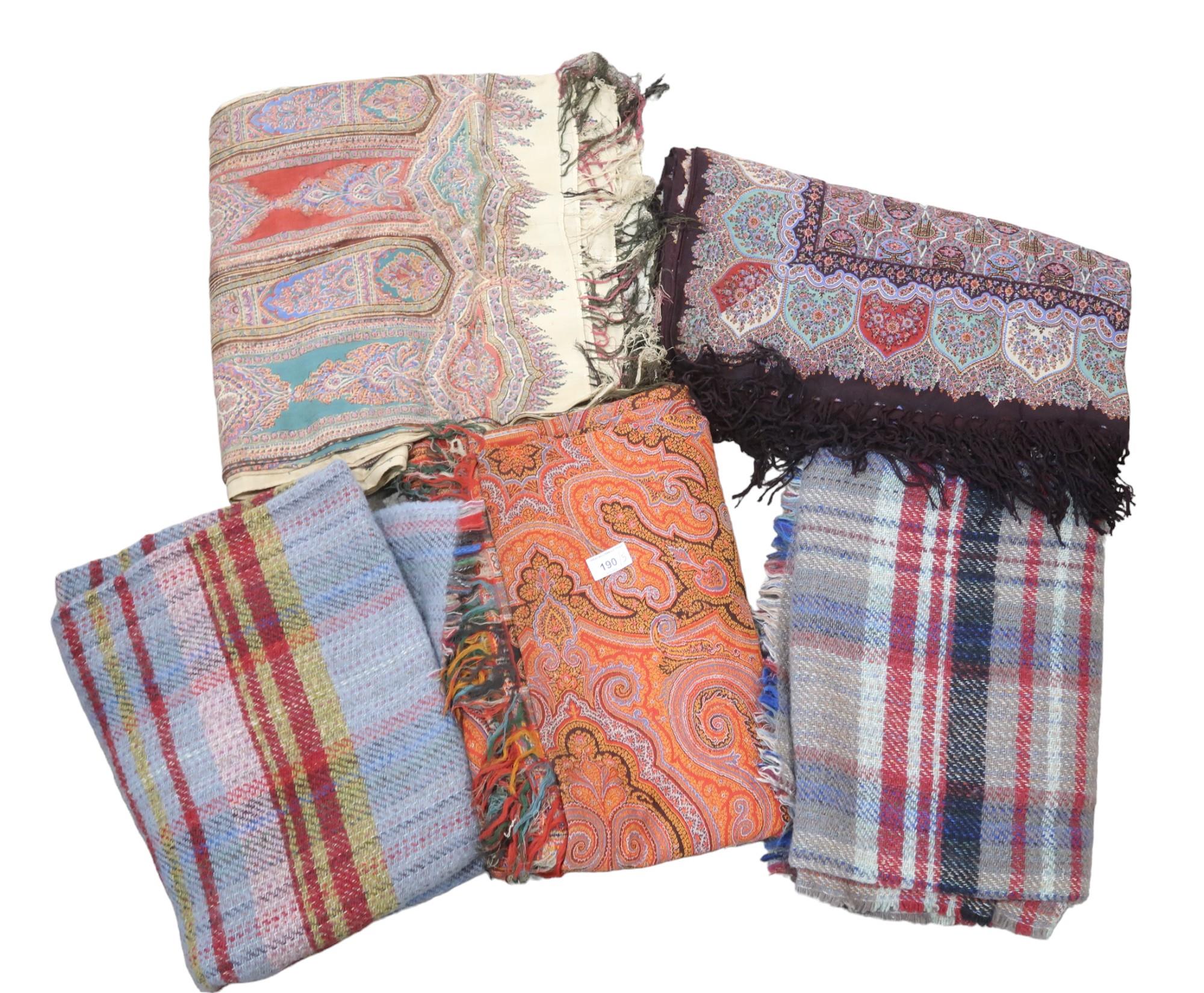 Two printed paisley shawls, a woven shawl and two woollen blankets Condition Report:Available upon