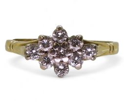 An 18ct gold boat shaped diamond cluster ring, set with estimated approx 0.50cts of brilliant cut