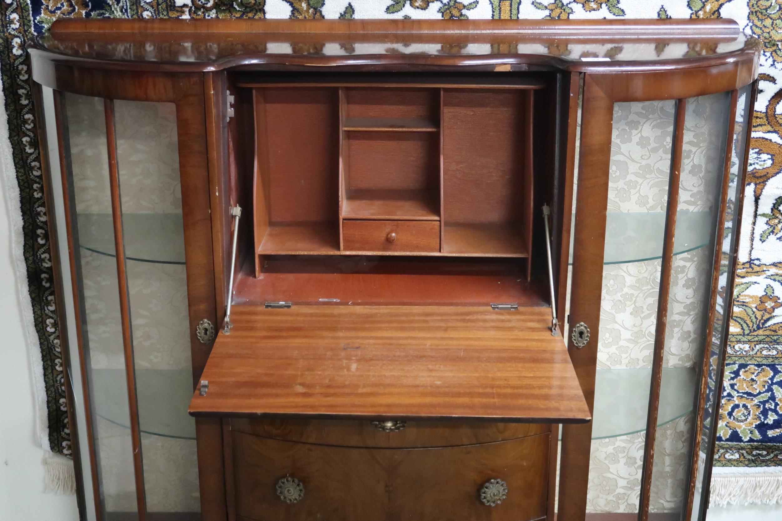 An early 20th century walnut veneered serpentine front bureau bookcase with central fall front - Image 2 of 2